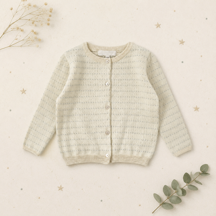 Cream long-sleeve pointelle cardigan with ribbed edges and a button closure
