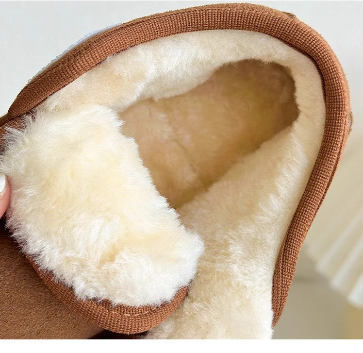 Close-up of cream plush lining inside a brown children&