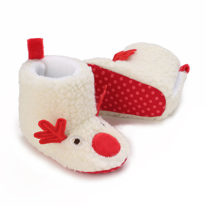 Cream reindeer baby booties with red antlers, red noses and a red dotted sole