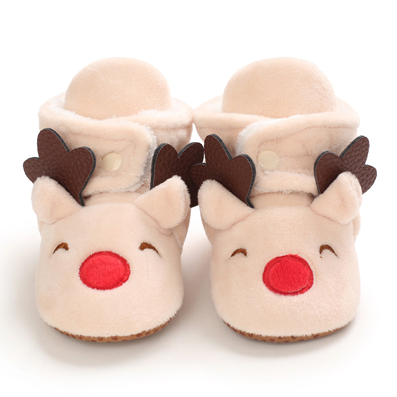 Cream baby slippers with reindeer faces, brown antlers and red noses