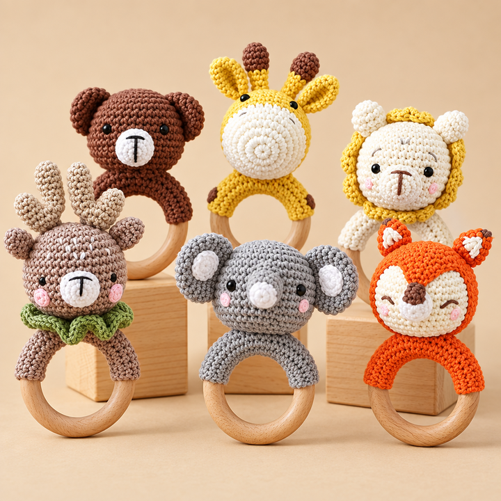 Bear, giraffe, lion, deer, elephant, and fox crochet rattles with wooden rings