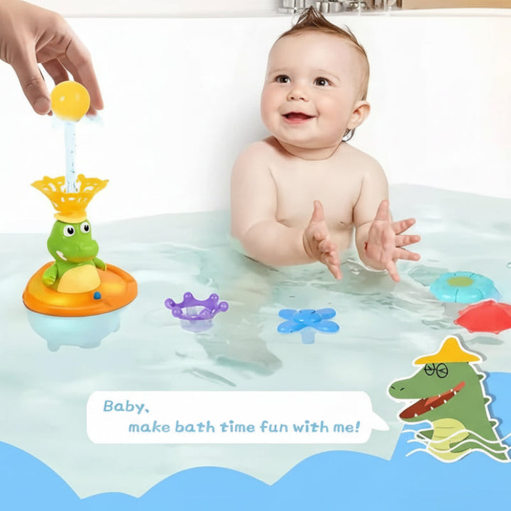 Child beside a floating crocodile bath toy with a yellow ball held above the fountain