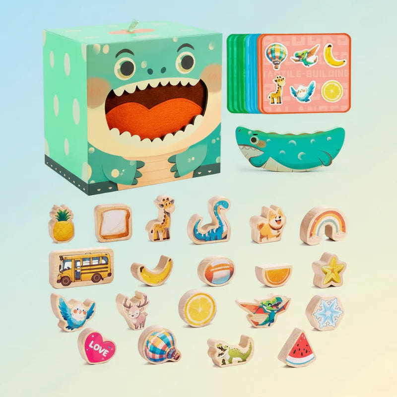 Crocodile stacking game with wooden shapes, matching cards, a green balance base, and a play box