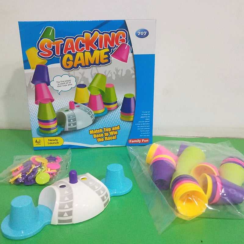 Cup stacking set with packaging, game base, blue cup holders, cups, and color-matching pieces