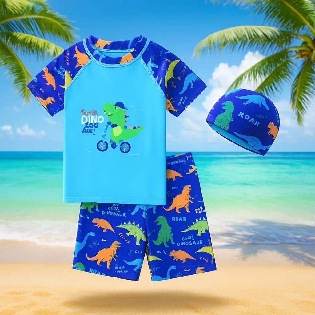 Blue cycling dinosaur swim shirt, dinosaur-print shorts, and matching swim cap