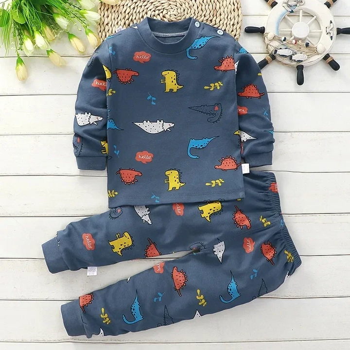 Dark blue pajama set with multicolored dinosaur prints and matching long pants