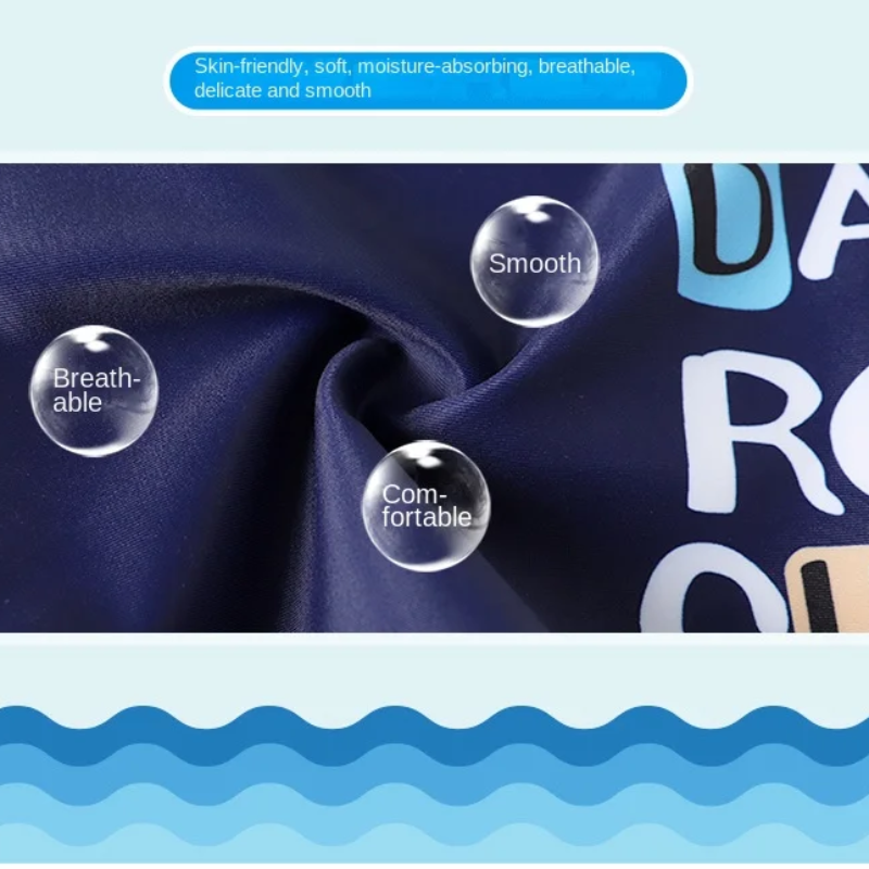 Close-up of dark blue printed swimwear fabric with texture and comfort callouts.