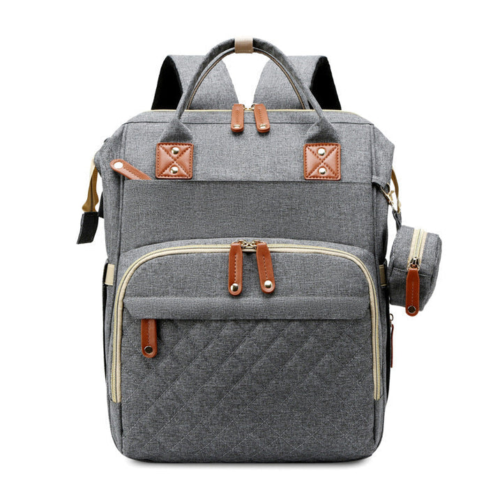 Dark gray diaper backpack with zippered front pockets and top carry handles