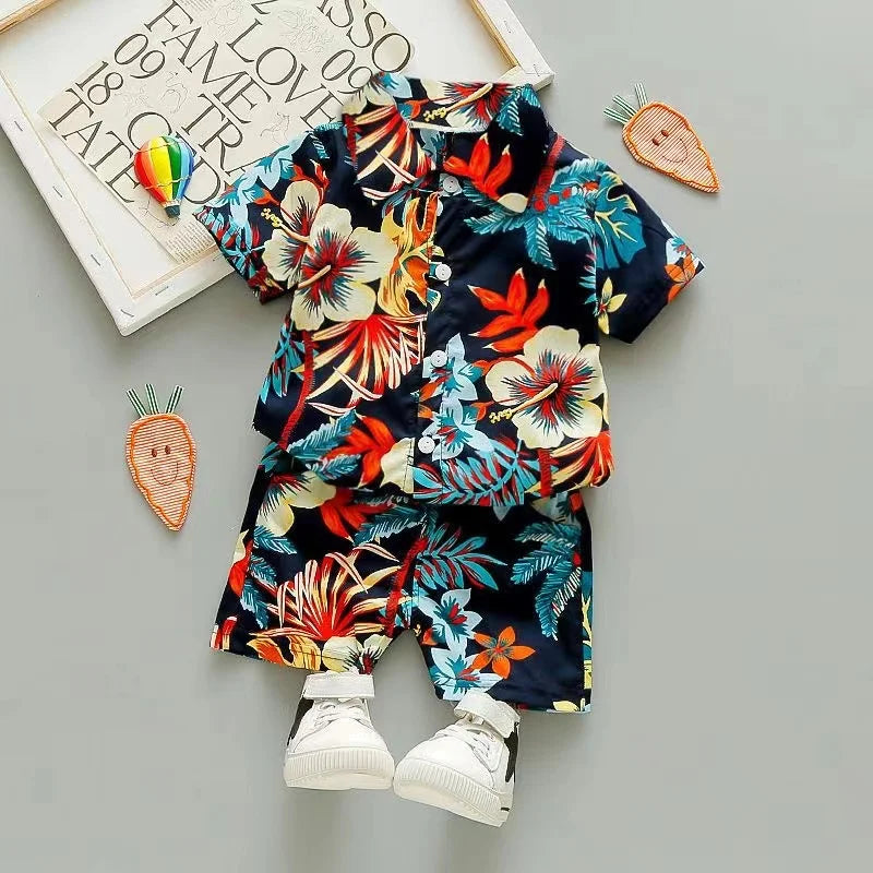 Dark shirt and matching shorts with colorful tropical flowers and leaves