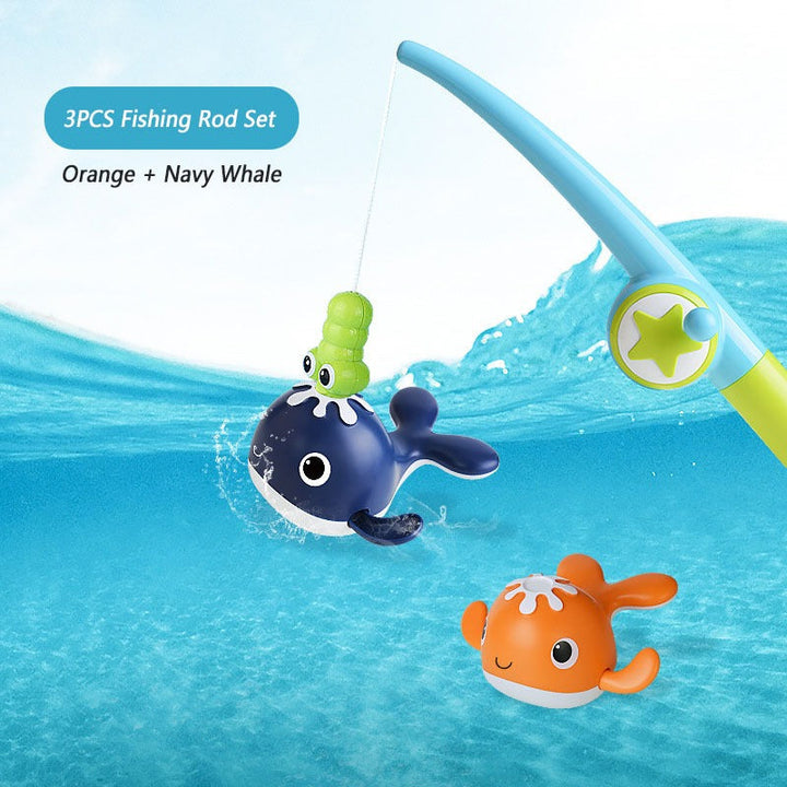 Three-piece dark-color bath fishing set with orange and navy whales and a magnetic fishing rod.