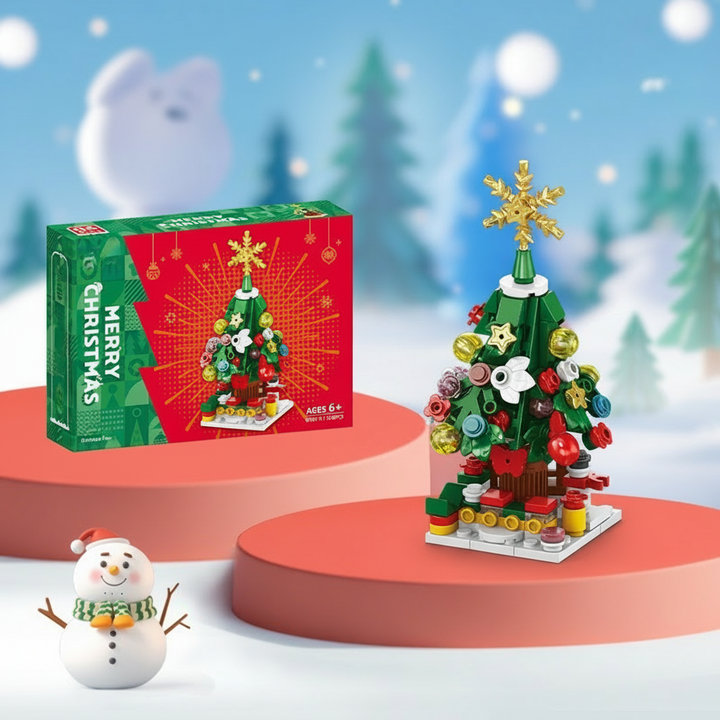 Christmas tree building model with a gold star and colorful ornaments beside its box