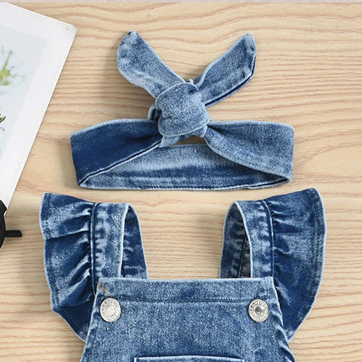 Matching denim bow headband above the romper&