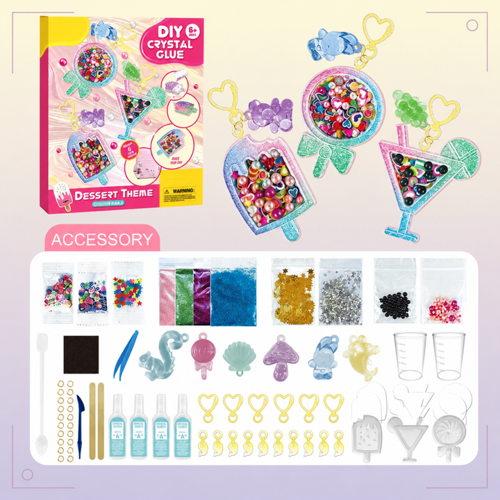 Dessert-themed resin keychain kit with popsicle and drink charms, molds, glitter, and colorful beads