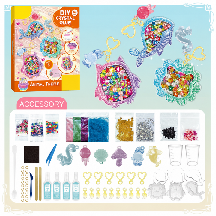 Animal-themed resin keychain kit with molds, resin bottles, glitter, beads, and keychain hardware