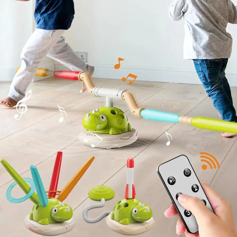 Dinosaur activity playset with rotating jump bar, ring-toss and rocket setups, and remote control