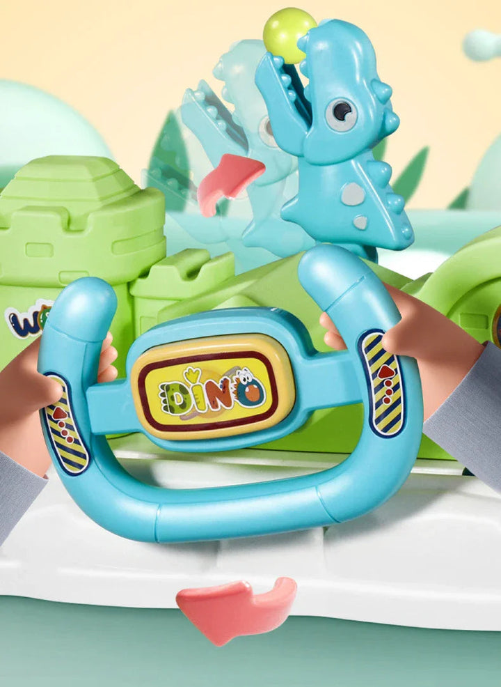 Close-up of the blue steering wheel and dinosaur figure on the ball-catching toy.