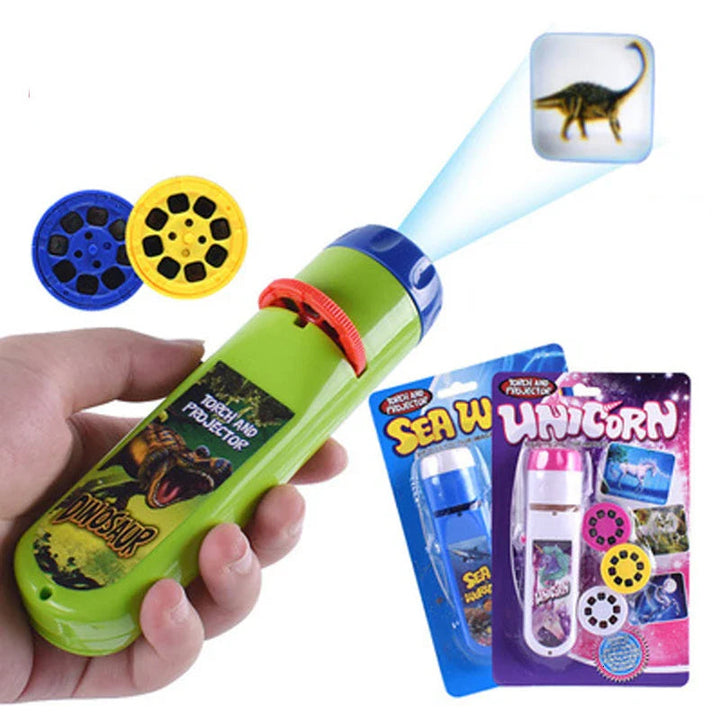 Handheld dinosaur projection flashlight casting a dinosaur picture beside slide discs and themed packages