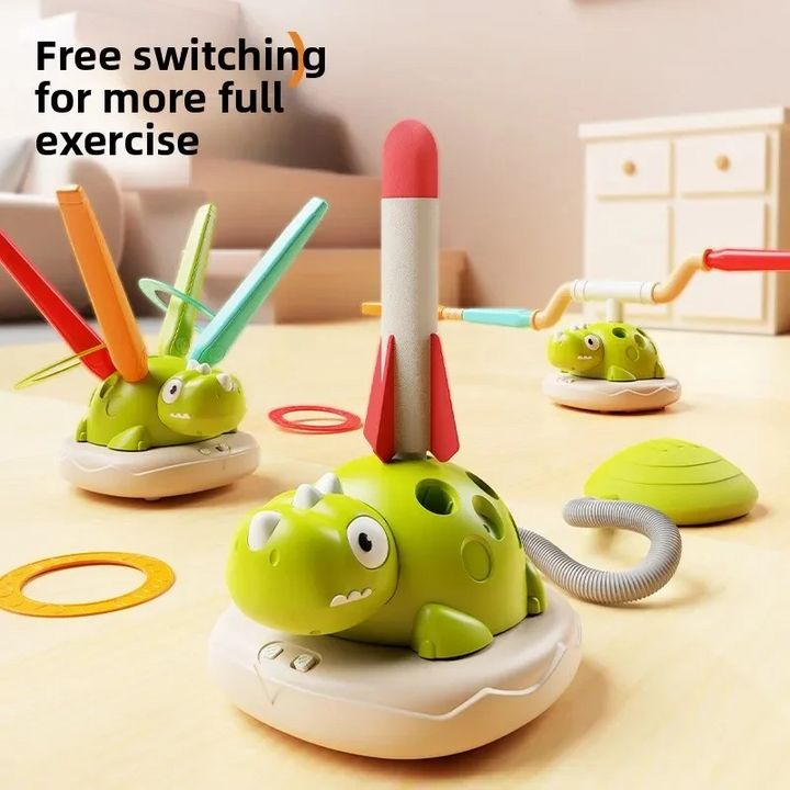 Green dinosaur activity bases arranged for ring toss, rocket launching, and jumping