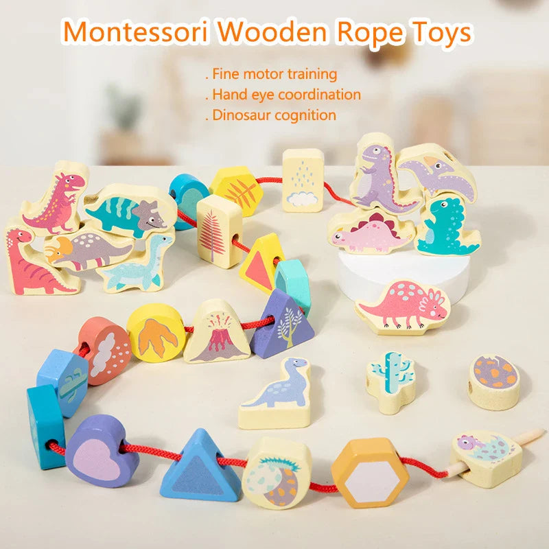 Dinosaur-shaped wooden beads and geometric shapes arranged on a red lacing cord.