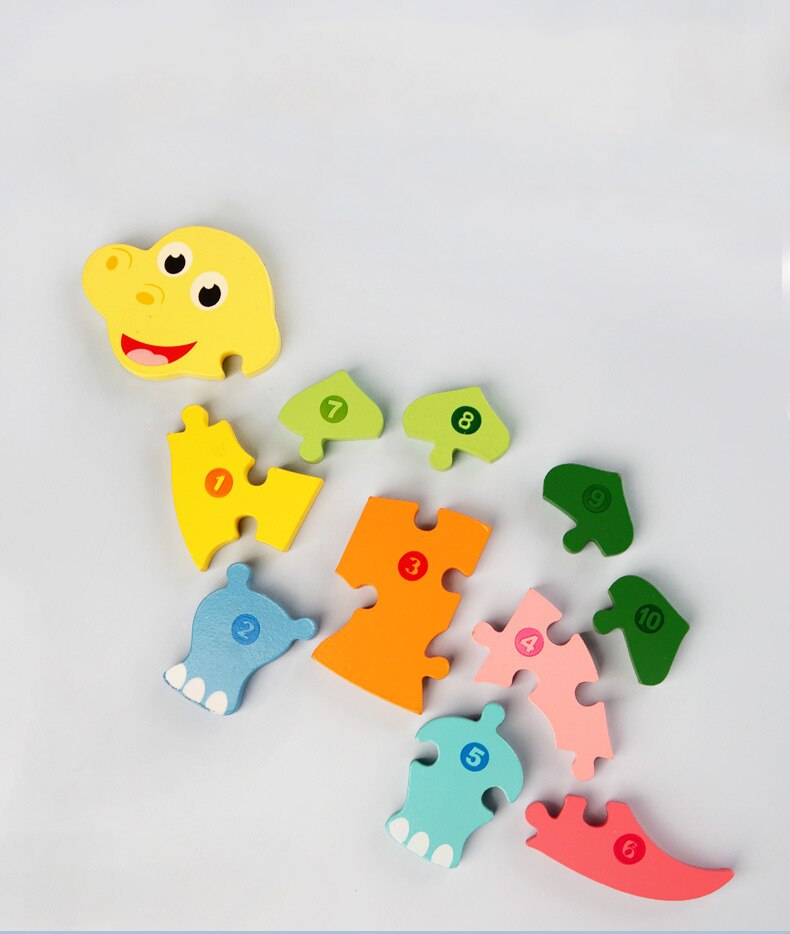 Separated colorful dinosaur puzzle pieces with numbers beside the yellow head