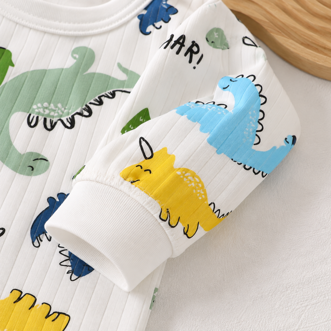 Ribbed dinosaur-print pajama fabric with a long sleeve and white cuff