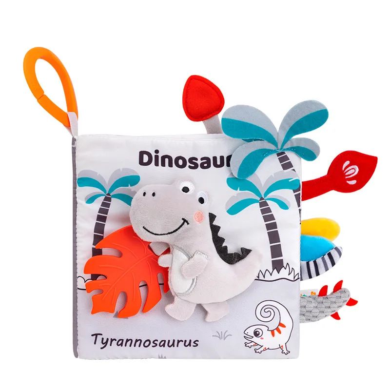 Dinosaur fabric book with a soft dinosaur on the cover, colorful tabs and an orange hanging loop