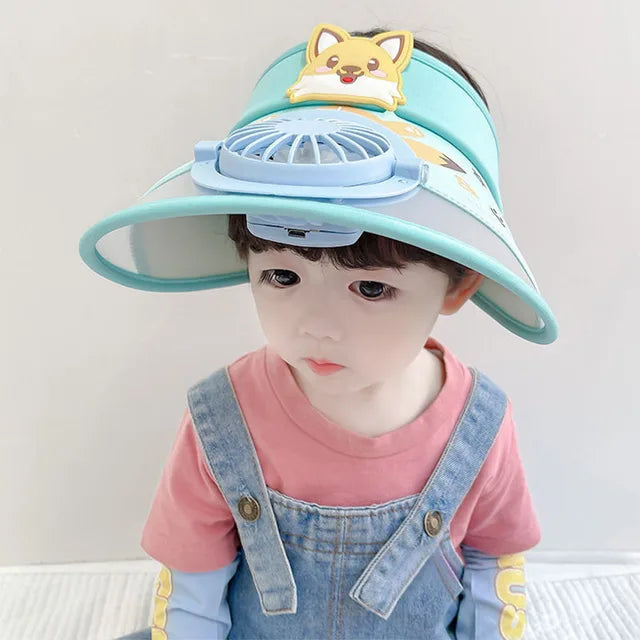 Child wearing a wide-brim fan hat with a cartoon dog and blue fan