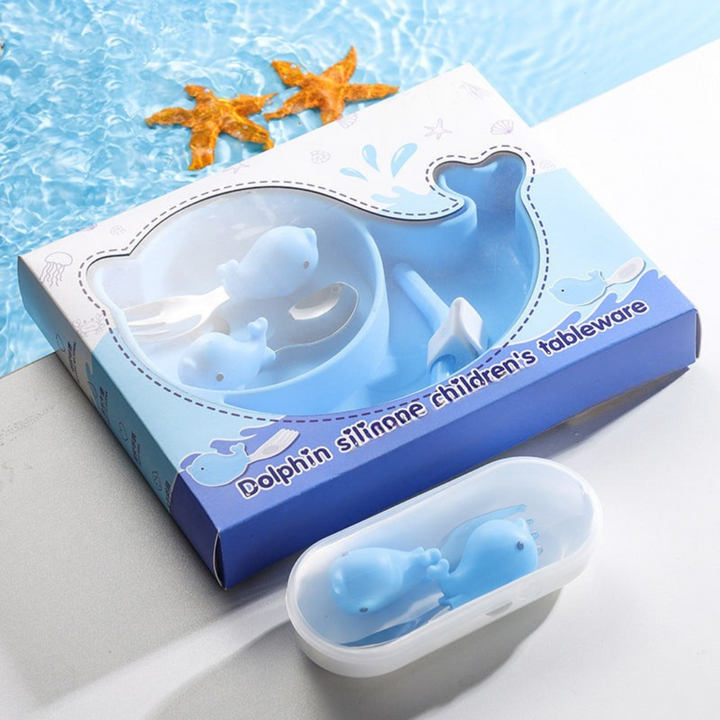 Light blue dolphin-shaped plate set in blue-and-white packaging