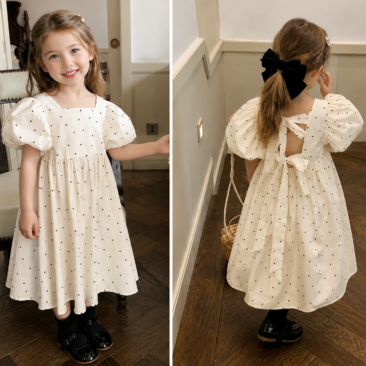 Front and back views of a white dotted kids&