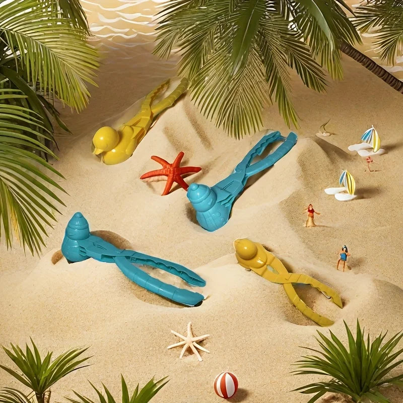 Yellow duck and blue snowman mold clips arranged on sand with beach decorations