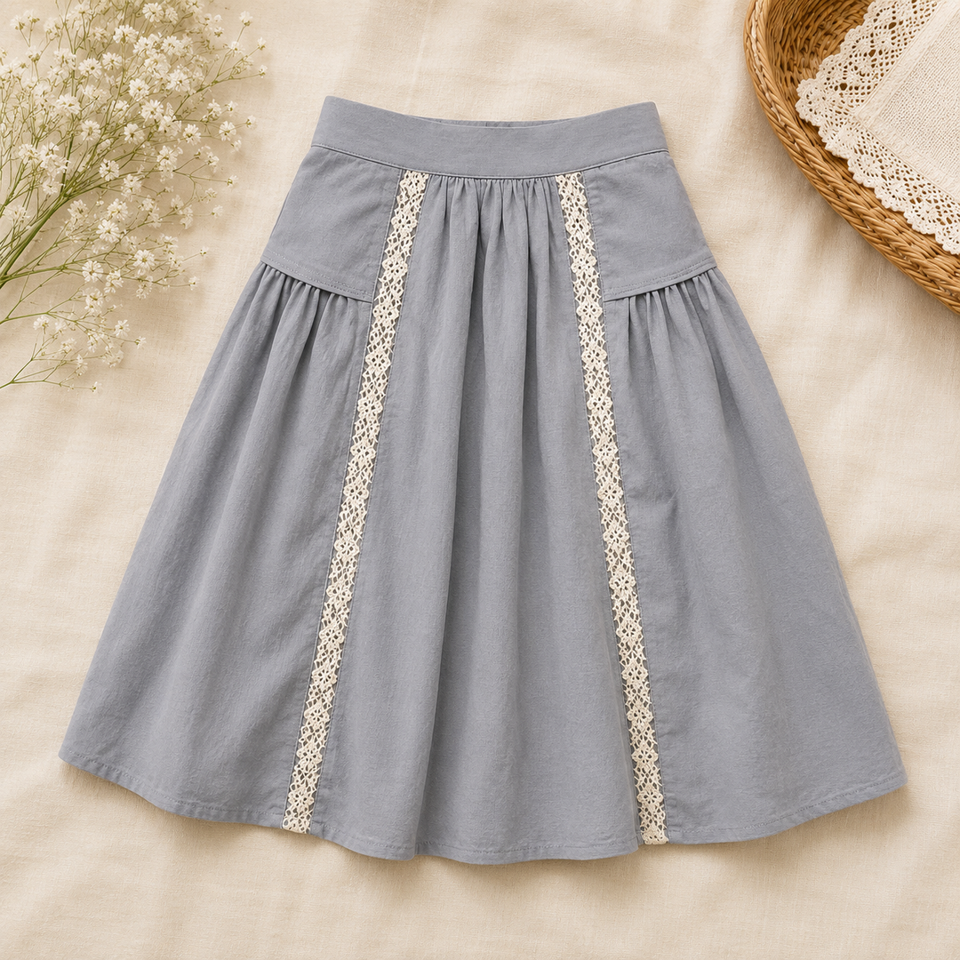 Dusty blue skirt with white lace trim and gathered panels