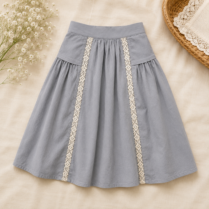 Dusty blue skirt with white lace trim and gathered panels