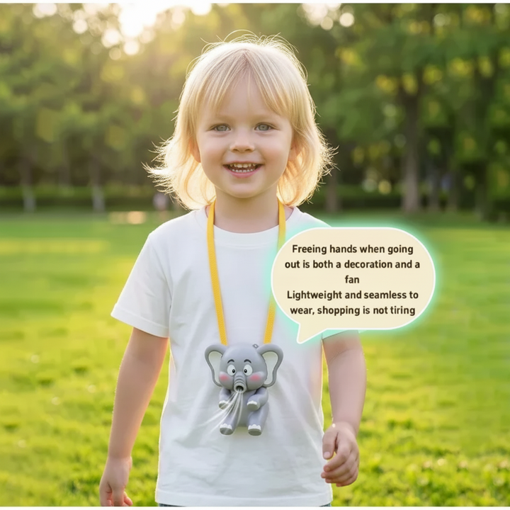Child outdoors wearing an elephant-shaped fan on a yellow cord