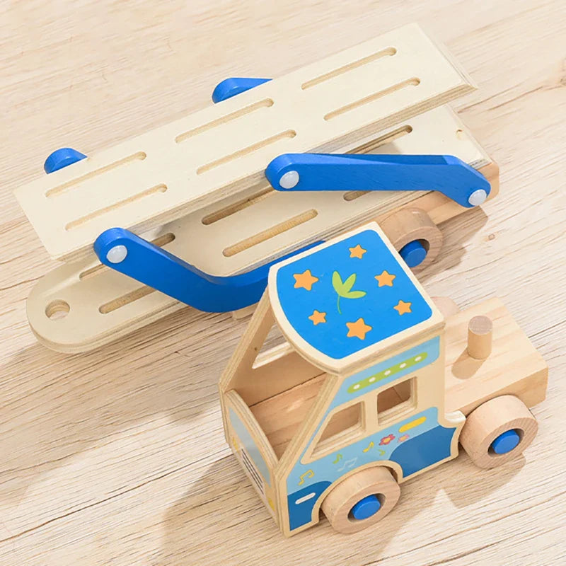 Empty blue wooden carrier truck showing its slotted upper deck and hinged loading ramp.