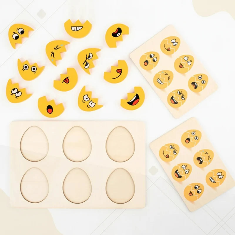 Empty six-slot wooden board surrounded by separated face pieces and expression cards