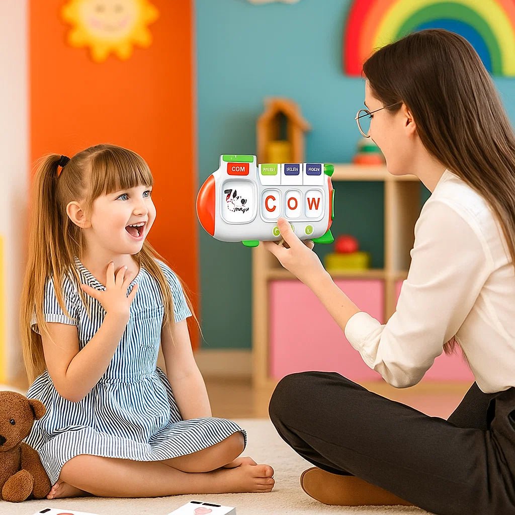 Adult and child using an English card reader with a cow picture card and matching letters.