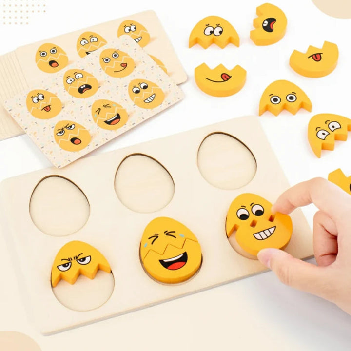 Yellow expression pieces and matching cards arranged around a wooden puzzle board