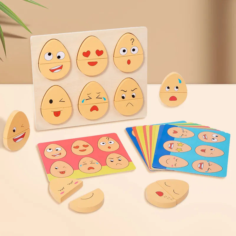 Wooden expression puzzle with six egg-shaped faces, loose face pieces, and colorful matching cards