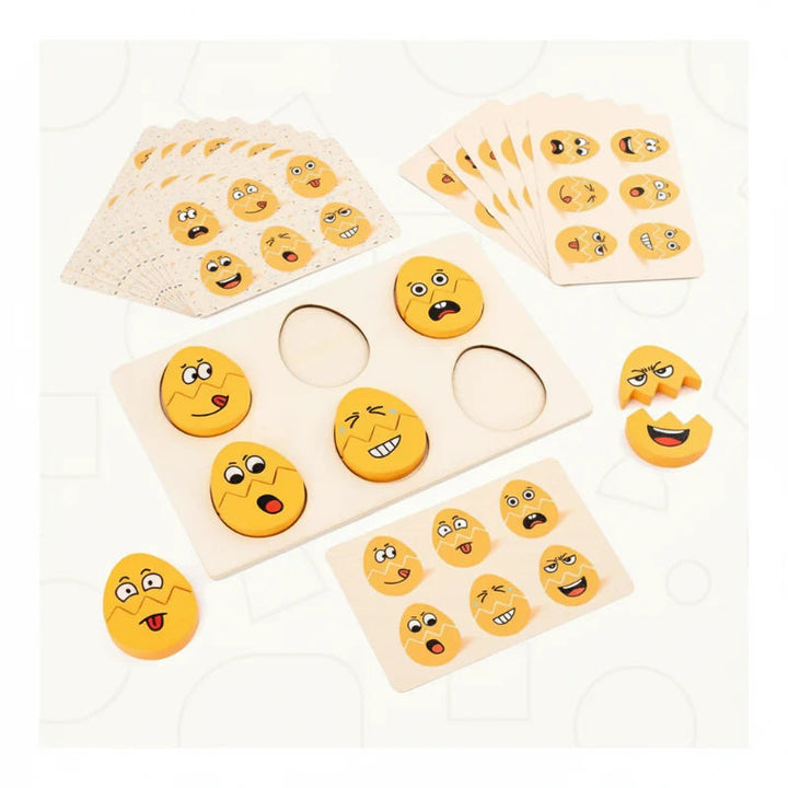 Wooden facial-expression puzzle with yellow egg-shaped pieces, a six-slot board, and matching cards