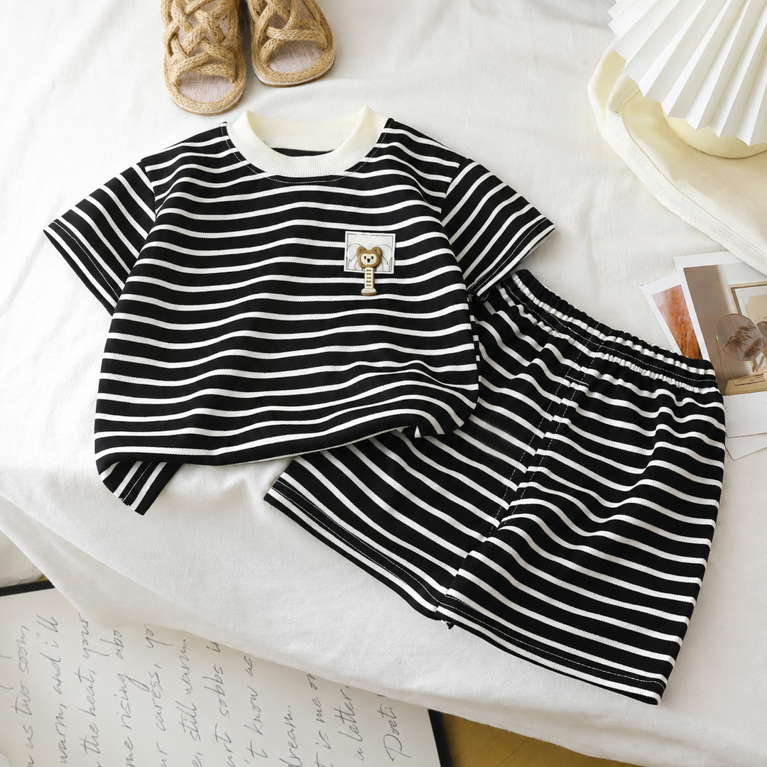 Black T-shirt and shorts with fine white stripes, a white neckline, and a small animal chest patch.