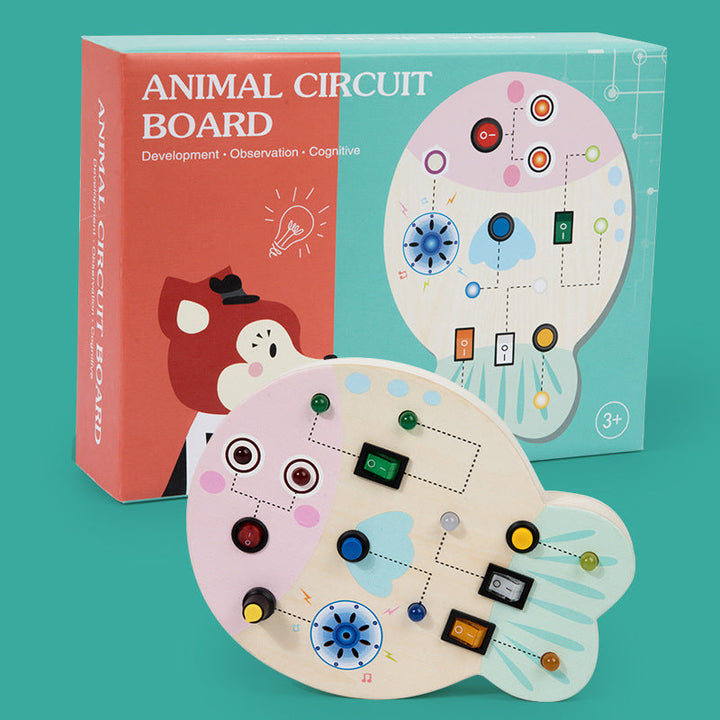 Fish-shaped wooden LED activity board beside its packaging