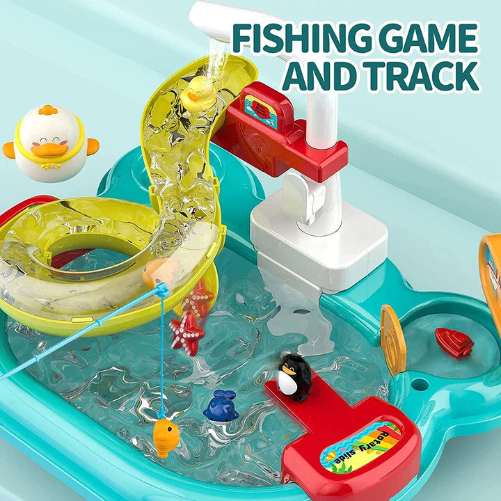 Fishing rod lifting a small toy from the water beside the curved sink track