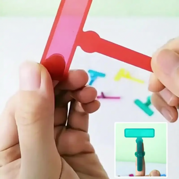 Hands bending a red plastic reading guide to show its flexible design.