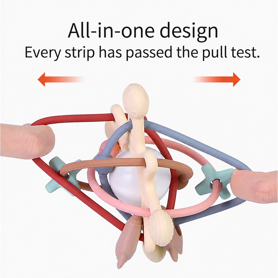 Hands stretching the flexible loops of a silicone teething ball