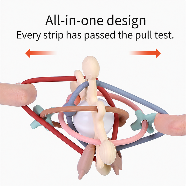 Hands stretching the flexible loops of a silicone teething ball