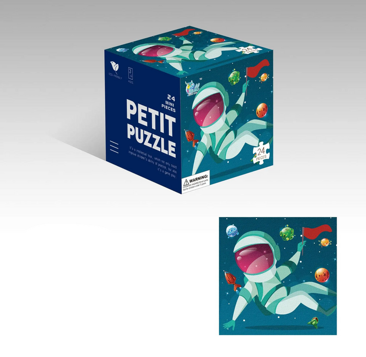 Astronaut jigsaw puzzle with planets and a matching cube box