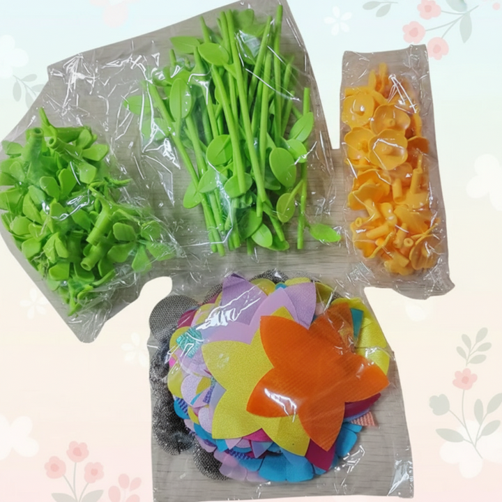Packaged fabric petals, green stems, flower bases, and orange flower centers without a machine