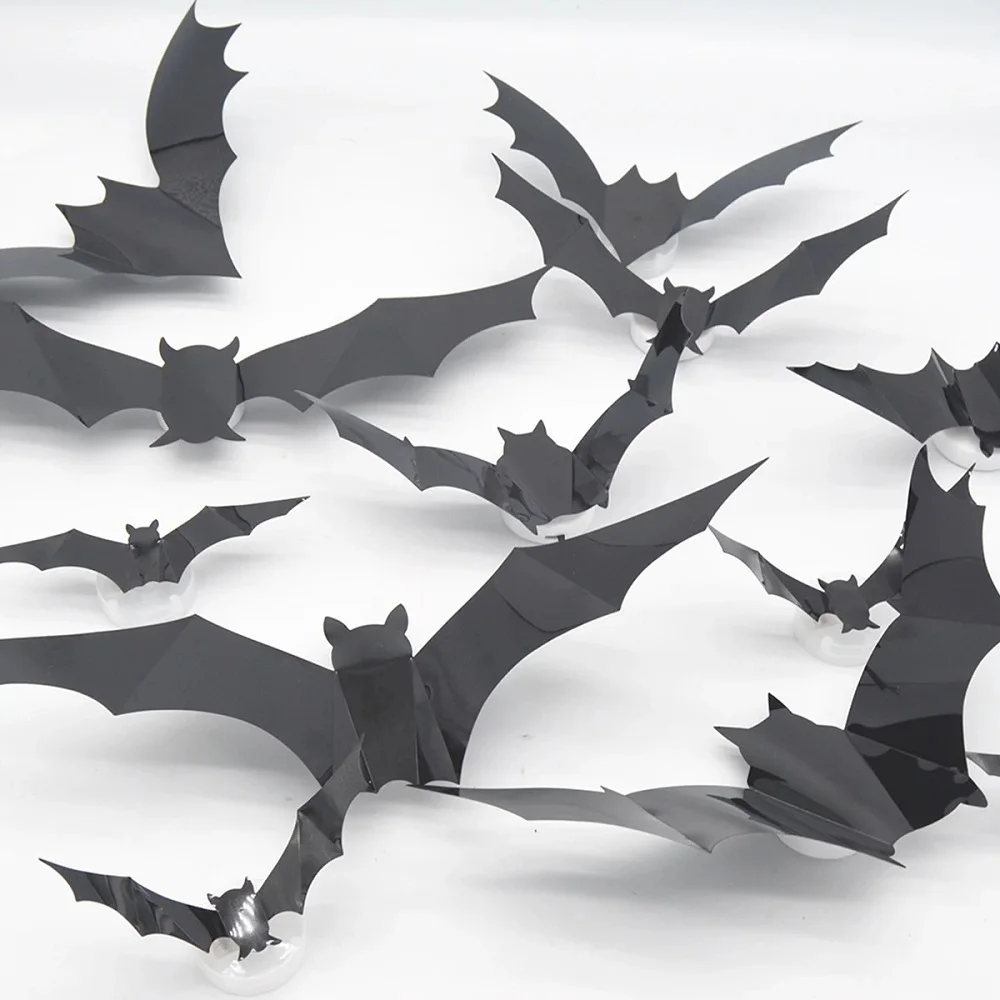 Close-up of black plastic bats with folded wings creating a raised 3D shape