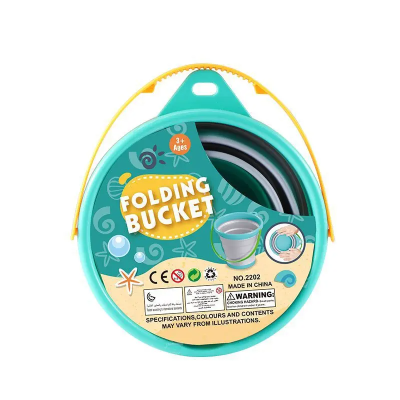 Folded teal and gray sand bucket with a yellow handle in retail packaging.