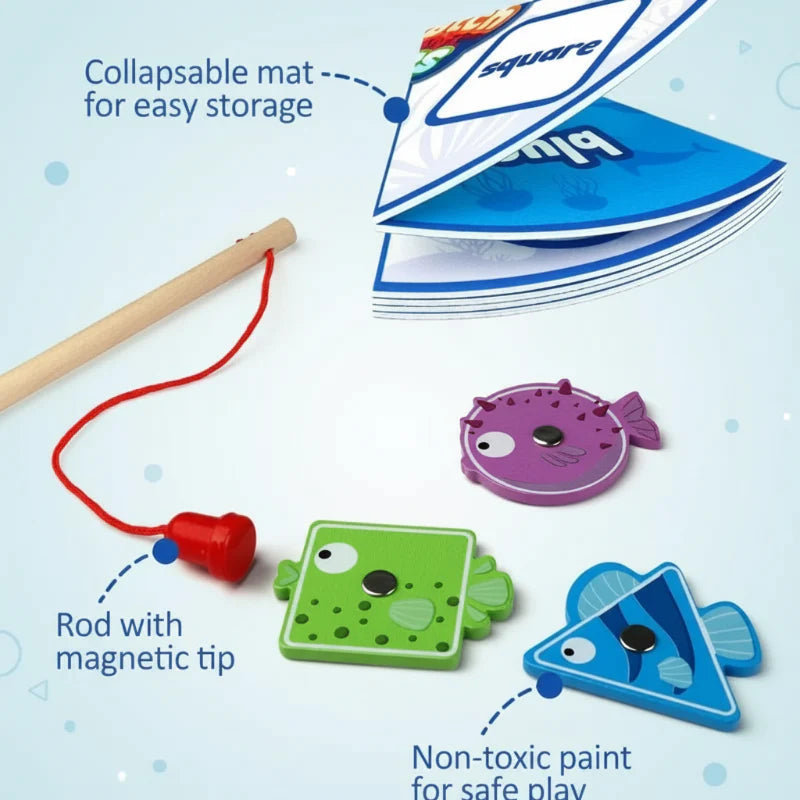 Folding sorting mat beside a magnetic fishing rod and colorful wooden fish